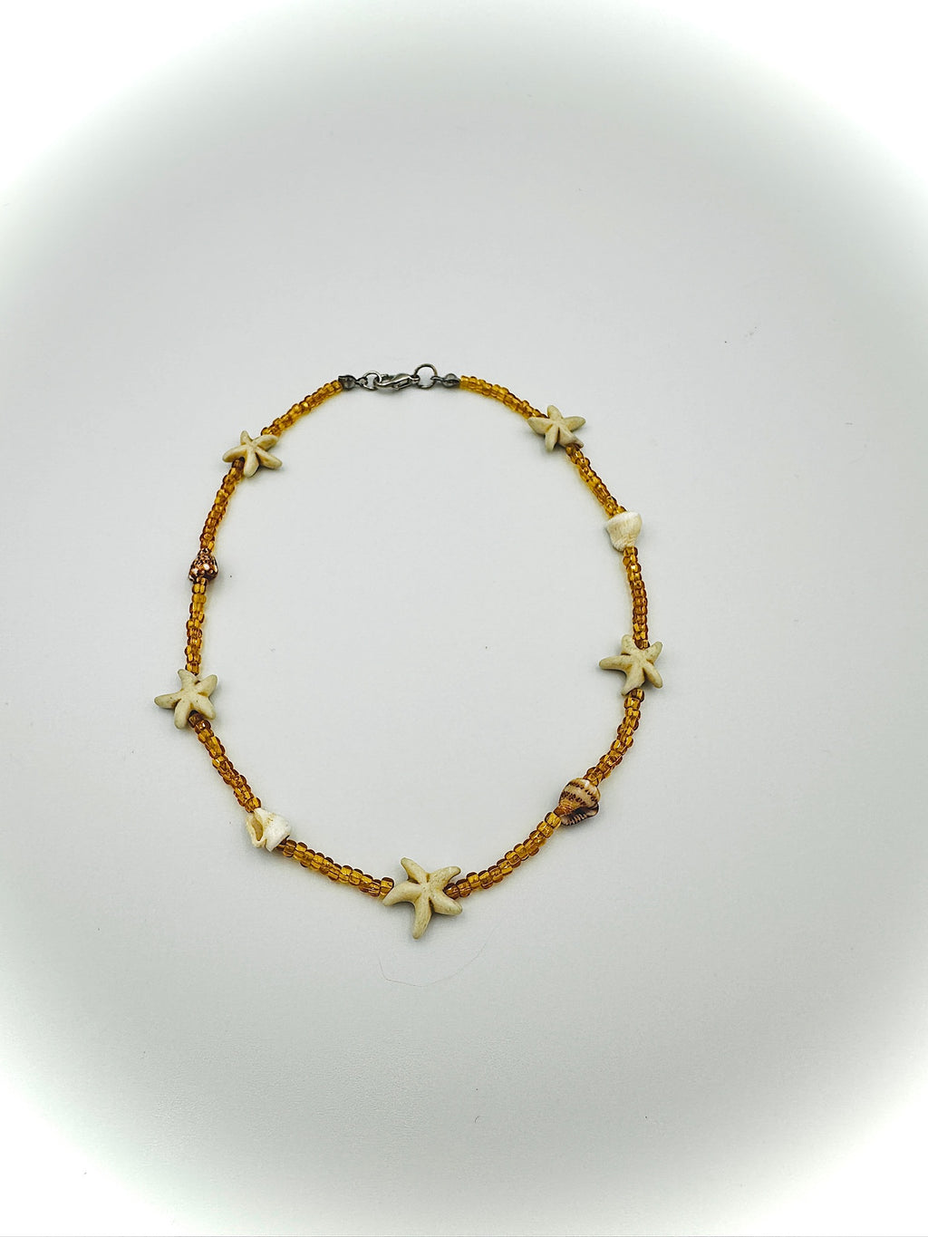 Starfish bracelet on a white background