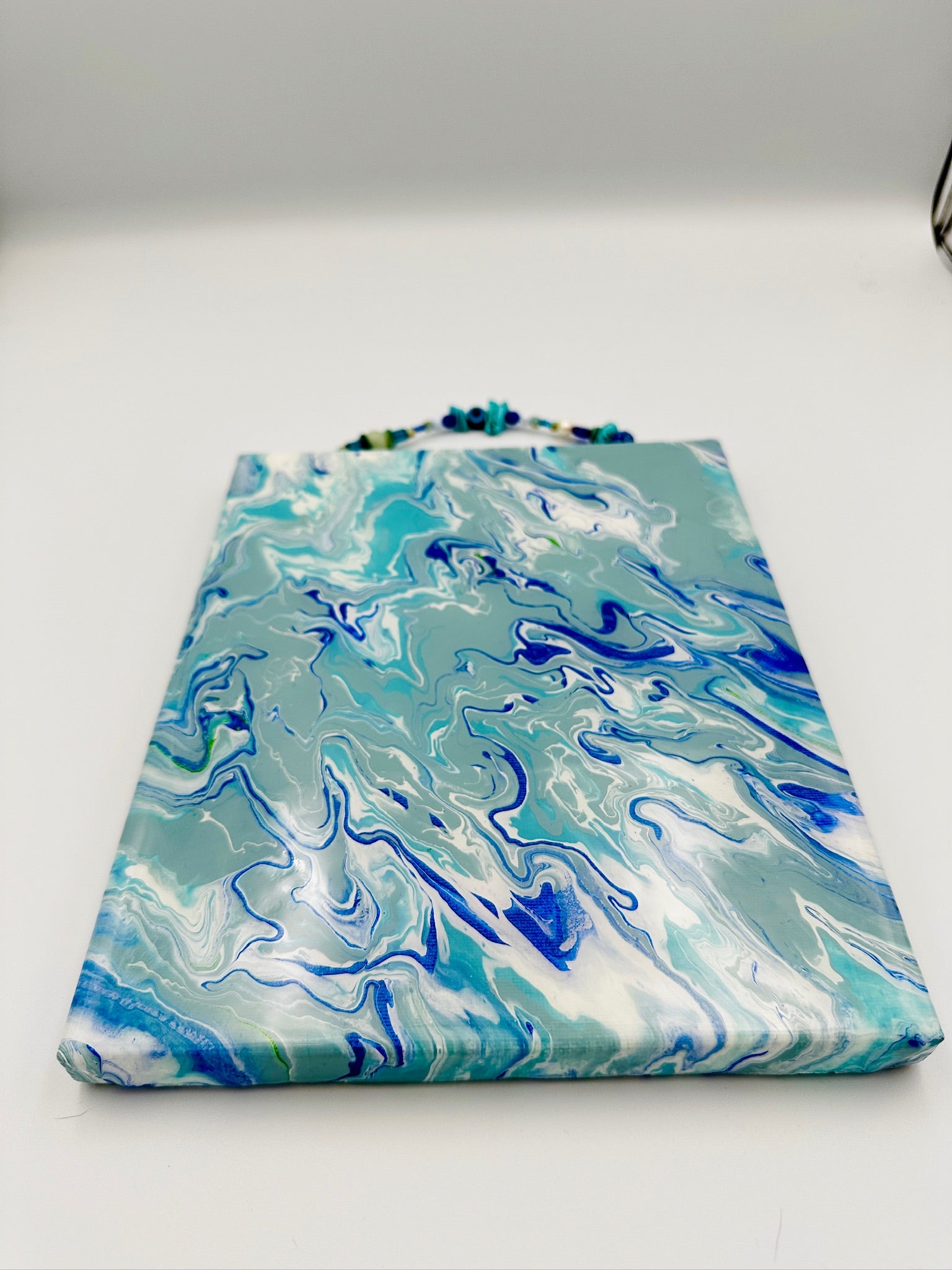 Marbled blue and white fabric on a white background