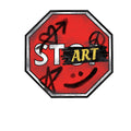 Red stop sign with artistic text and symbols on a white background