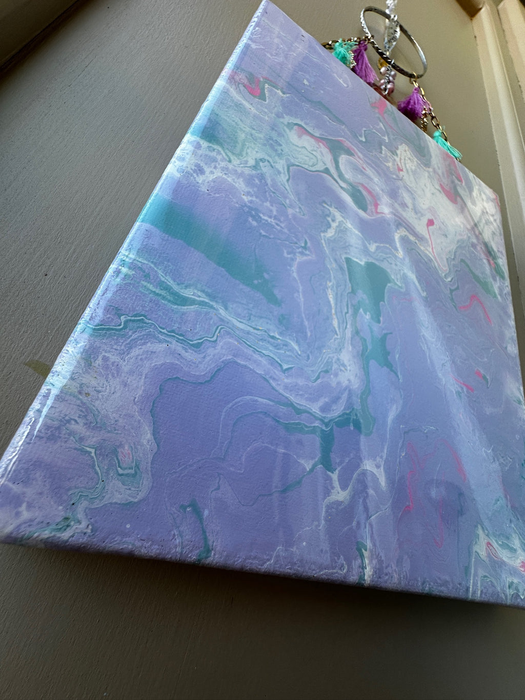 Marbled notebook with blue and purple patterns on a plain background